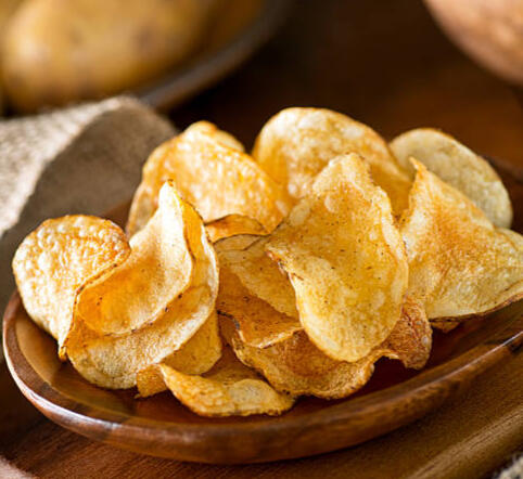 Magical Root Chips These Crispy-golden, thin slices of enchanted root crisps tossed in sea salt and served warm.