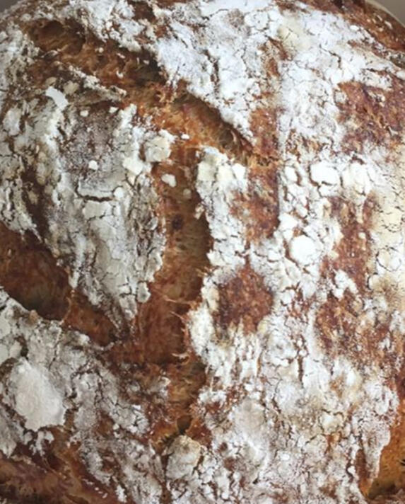 Hearth Bread A round, pull-apart loaf infused with garlic, rosemary, bits of meat, and black sea salt, served warm and smoky. Butter on request.